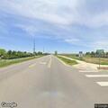 Single-car crash with driver walking near Mead
