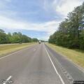 Truck off road with grass fire on I-65 southbound