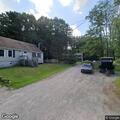 Suspicious car parked on lawn in Biddeford