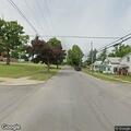 Two males fighting behind Ford Avenue residence