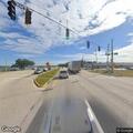 Traffic hazard from woman and dog in roadway