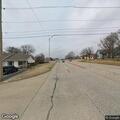 Person showing signs of heat stroke in roadway