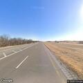 Single-vehicle crash with smoke in highway median