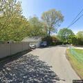 Woman with abdominal pain in car on Leonard Drive