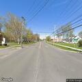 Officer checks bicyclist on Genesee Street