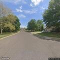 Person experiencing abdominal pain on Haggerty Road