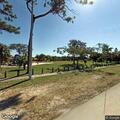 Vehicles gathered in Bay of Pigs Memorial parking lot