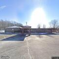 Officer assists citizen in school parking lot