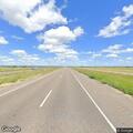 Reckless driving by red pickup on Highway 83