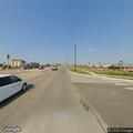 Disabled vehicle with hazards on Sixth Street