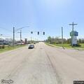 Report of person standing in middle of Michigan Road