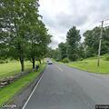 Single-car crash with fluid leak on Hatch Hill Road