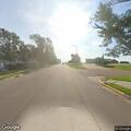 Speeding motorcyclist passing cars on highway shoulder