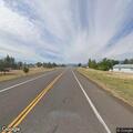 Reckless white van speeding on US 97 near Macdoel