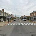Officer assists with traffic light change at intersection