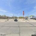 Traffic crash involving gray passenger car