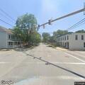 Vehicle partially blocking curve on High Street