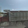 Vehicle off road with wires blocking roadway