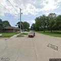 Low-hanging cable reported near Belmond sidewalk