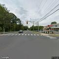 Single-car crash near car wash parking lot