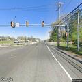 Traffic signal flashing yellow near Wawa
