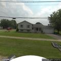 Suspicious man seen loitering in front yard