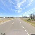 83-year-old female falls at highway service road