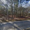 Tree blocking roadway on Hosston Vivian Road