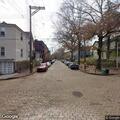 Officers check parked vehicle on Green Street