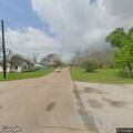 Man possibly intoxicated lying on ground in Bay City