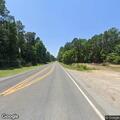 Traffic stop on white GMC SUV in Bauxite