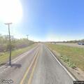 Single vehicle rollover crash in roadside ditch