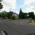 Car and e-bike crash with person down in roadway