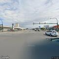 Man down in street at Bailey and Broadway