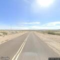 Unknown 911 call with background noise near Bishop Hwy