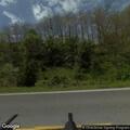 Officer nearly struck by vehicle on Woods Mill Road