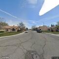 Male adult lying on sidewalk near 23rd street west