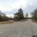 Tree blocking road at South Main Street and Highway 97
