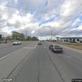 Traffic stop with red Toyota Camry at intersection