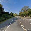 Vehicle leaking fluids after crash on Tyler Mill Road