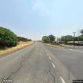 Report of body lying under blanket on roadside