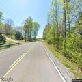 Fallen trees block Highway 49 at Long Creek Road
