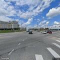 Traffic stop involving green Ford and black Mercedes