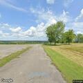 Two cars collide in parking lot, no injuries