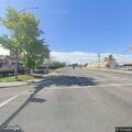 Disabled SUV with flat tire on Redwood Road