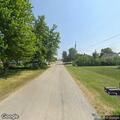 Woman conscious with headache near Cleveland Avenue