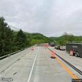Stopped SUV blocking road near Friendsville Hill