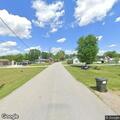 Neighbor reportedly firing gun across road, hitting fence and possibly a house