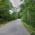 Person with severe abdominal pain at Babuska Lake Rd