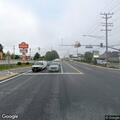Pedestrian walking in middle of York Road
